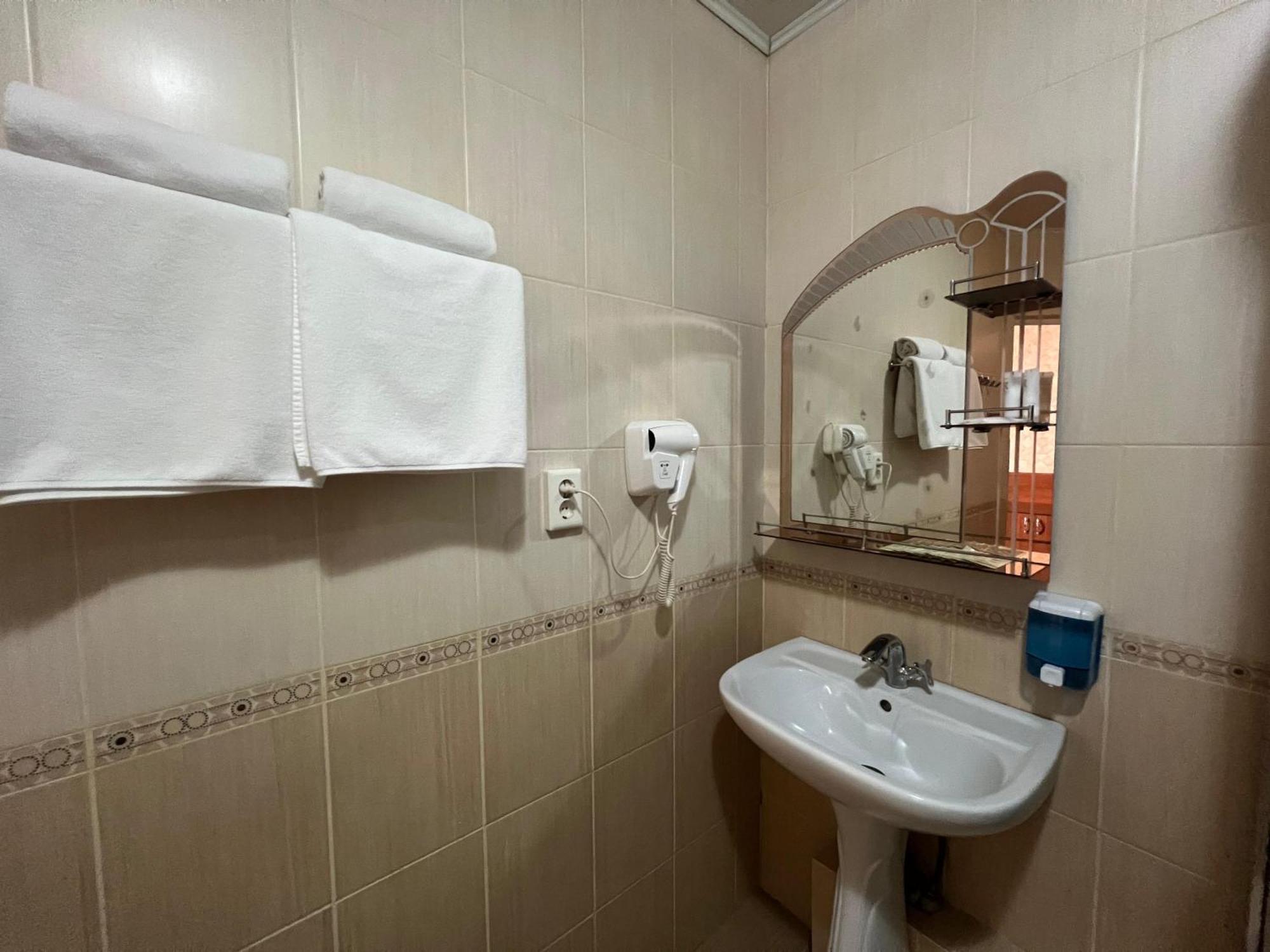 Three Dolphins Hotel Aktau  Exterior photo